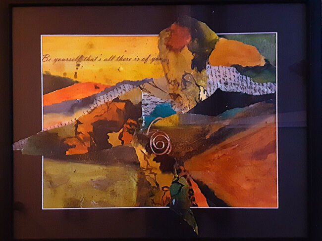 Multi colorful collage under glass